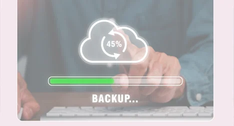 a close up of a computer screen with a line drawing of a cloud , the word backup and a green progress bar