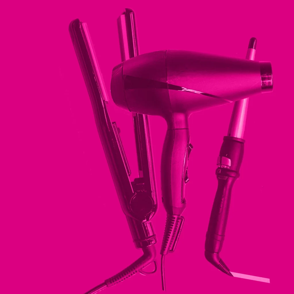 RYE0404_Infographics_Grooming_ Floating hairdryer, tongs and straighteners in a pink haze against a bright pink backdrop