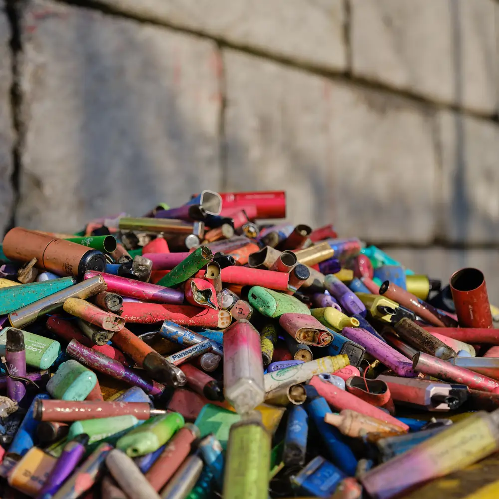 Vapes RYE feb featured image 1000 x 1000 a large pile of discarded single use vapes on the ground